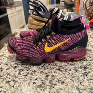 Nike Black and Pink Knit Sneakers with Yellow Accents